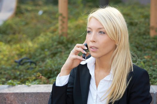 Businesswoman using mobile phone