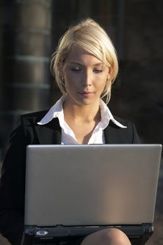 Young businesswoman working with laptop computer