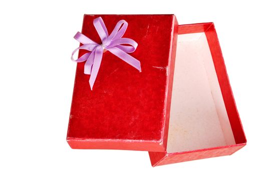 Empty old red gift box with lid and bow on a white background