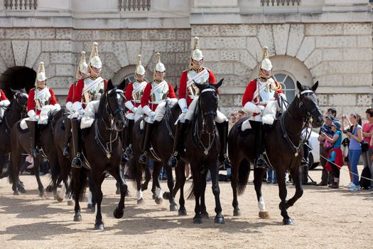 LONDON - JUNE 14: The Queen's Life Guard or Horse Guard Changing ceremony in London, UK on June 14, 2011. Guard Mounting Ceremony is held daily during spring and summer on Horse Guards Parade