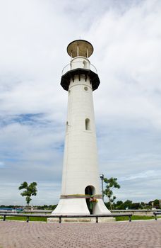 White lighthouse on the island in the middle river. Ayutthaya, Thailand.