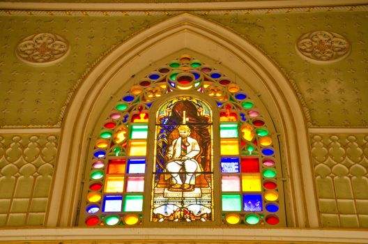 Decorated with stained glass windows.