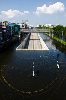 BANGKOK - NOVEMBER 13: A road tunnel dries and survives from the flooded area at Kaset - Navamin crossed roads during the massive flood crisis on November 13, 2011 Bangkok, Thailand.