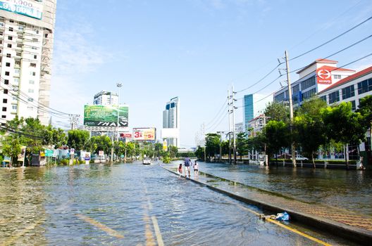 BANGKOK THAILAND – NOVEMBER 13: Scenes The Siam Commercial Bank, Limited in Bangkok during its worst flooding in decades is a major disaster on November 13, 2011 in Bangkok, Thailand.