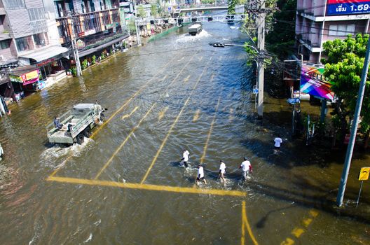 BANGKOK THAILAND – NOVEMBER 13: Scenes The Siam Commercial Bank, Limited  in Bangkok during its worst flooding in decades is a major disaster on November 13, 2011  in Bangkok, Thailand.