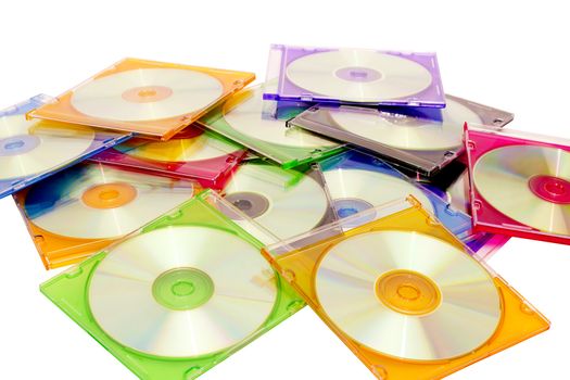 colorful CDs in boxes piled in a heap