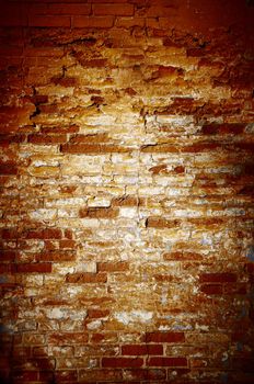 Background in style grunge. The old ragged broken wall