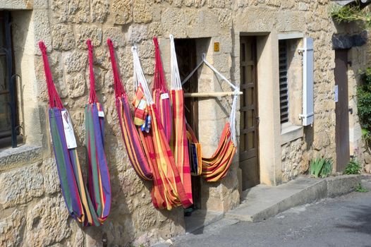 Shop of hammocks in a street of Domme