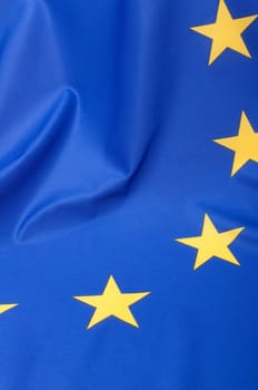 Closeup of Glossy Flag of European Union - EU Flag Drapery