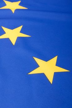 Closeup of Glossy Flag of European Union - EU Flag Drapery

