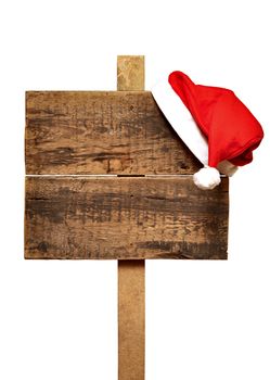 wooden road sign with Santa's hat  isolated on a white background 