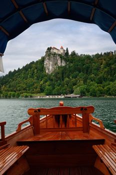 Bled Castle and traditional tourist boat