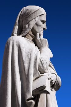 Photo of a detail of the statue of Dante in Verona Italy