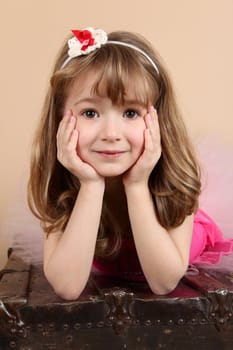 Beautiful little girl wearing a head band 