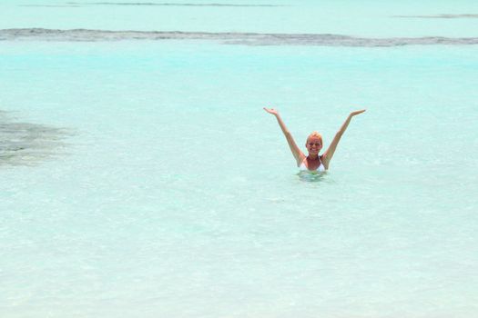 woman lying on the sand the ocean coast