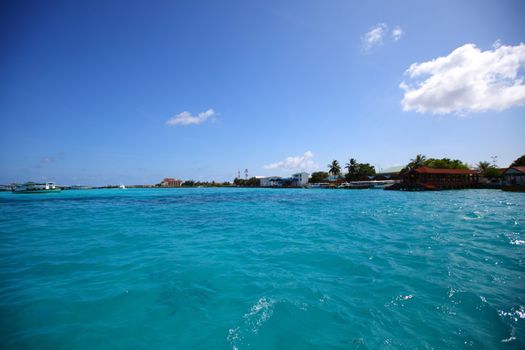 tropical island in blue sea