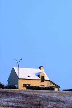 French allotment in winter under snow                             