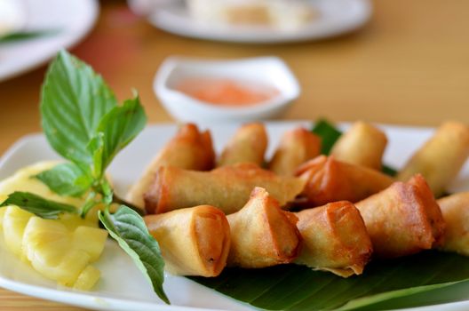 Chinese spring rolls with vegetable and pineapple