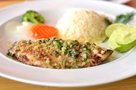 roasted fish served with fried rice