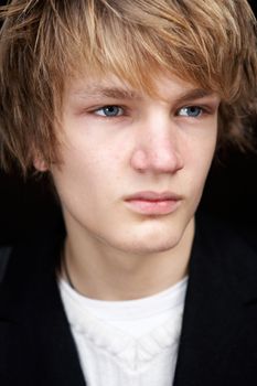 Portrait of teenage boy, vertical close-up