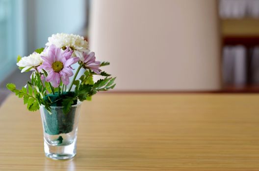 Flowers at table in restaurant