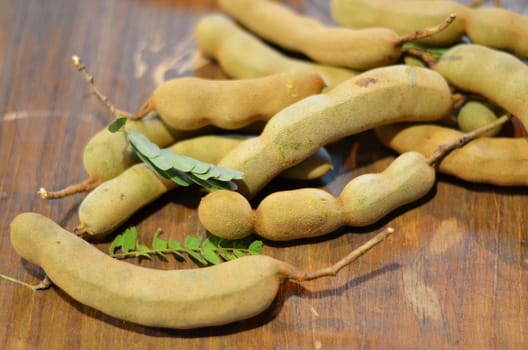 the tamarind on the wooden table