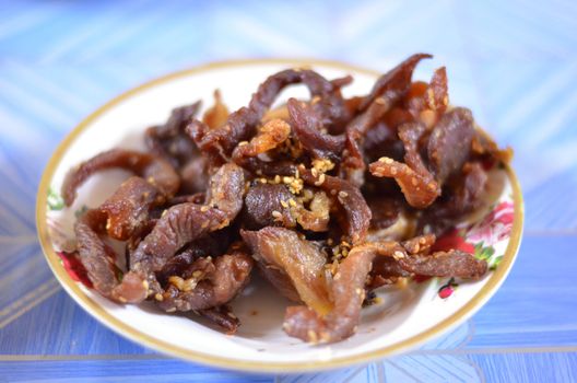 beef jerky with sesame on dish