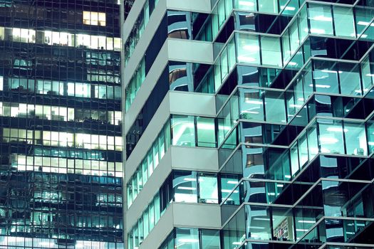 Seamless illustration resembling illuminated windows in a tall building at night 