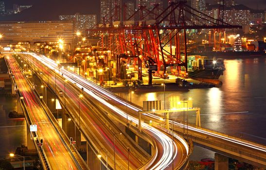 Overpass at night through the port