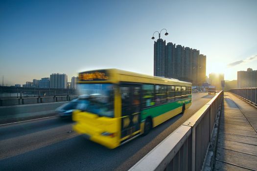 speed bus through sunset road