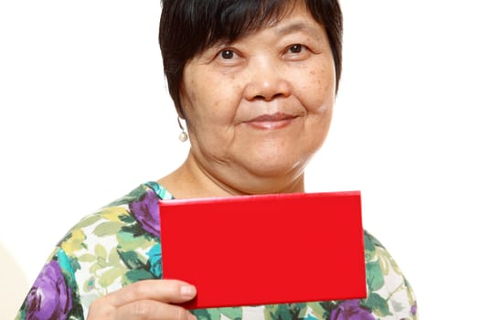 Asian woman holding a red card