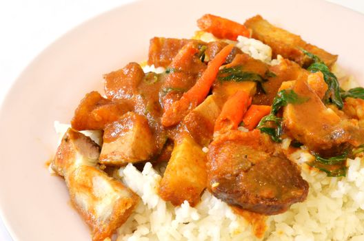 Stir fried crispy pork with red curry paste and rice