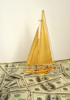 The image represents the things that you can buy. Yacht on dollars.