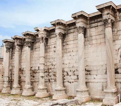 Corinthian columns of the ruins of the Hadrian's Library in the Roman Forum of Athens, Greece.