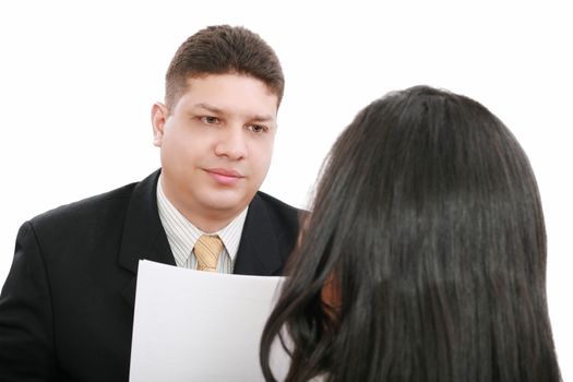 Business coaching concept. Young woman being interviewed for a job.