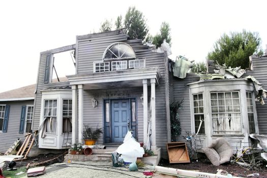 House damaged by disaster. Scenery for cinema