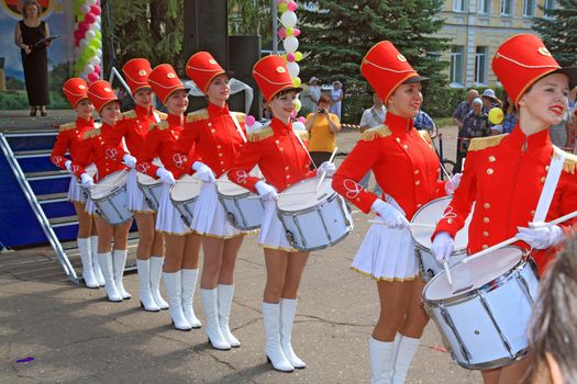 Staraya Russa, Russia - July 9: Young drummer girls at the parade on City Day Staraya Russa on July 9, 2011 in Staraja Russa, Russia.