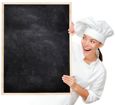 Chef showing blank menu sign blackboard. Woman Cook or baker looking happy and excited wearing chef uniform. Multicultural Asian Caucasian young female chef isolated on white background.