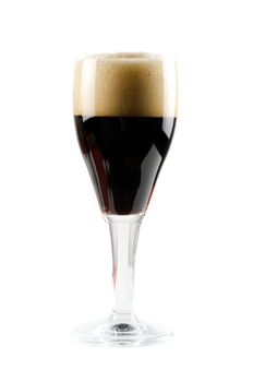 Glass of dark beer isolated on a white background