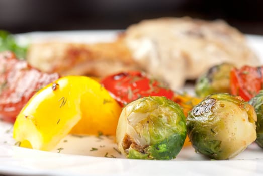 pork steak with mushroom sauce and grilled vegetables