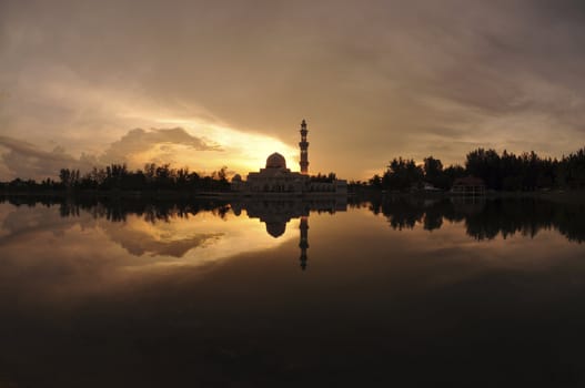 Masjid Tengku Tengah Zaharah or also known as Floating Mosque in Kuala Terengganu, Malaysia with reflection