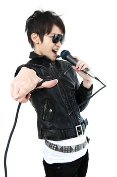 Asian rock singer in performance, isolated on white, focus on fingers.