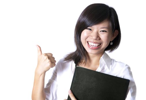 An Asian girl giving thumbs up sign and holding a file