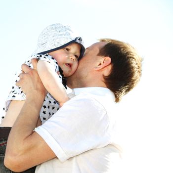 happy family blue sky on background