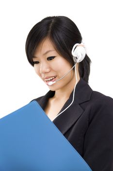 Friendly Customer Representative with headset smiling during a telephone conversation