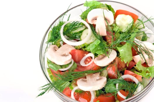 Healthy salad with lettuce, tomatoes, cucumber, onion and mushrooms