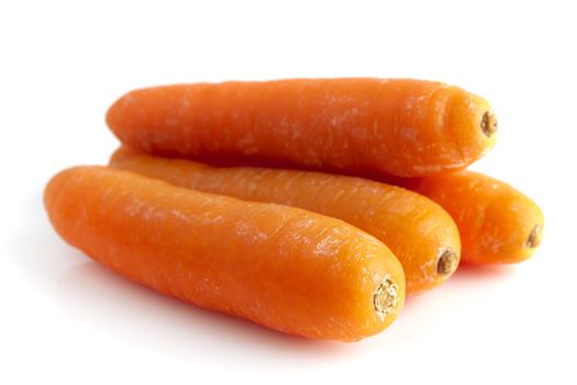 Pile of carrots isolated on white background.
