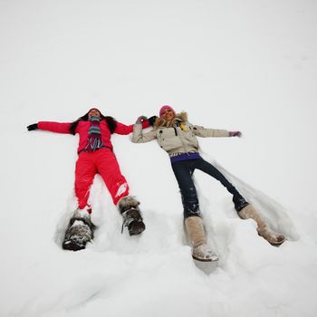 winter woman lay on snow