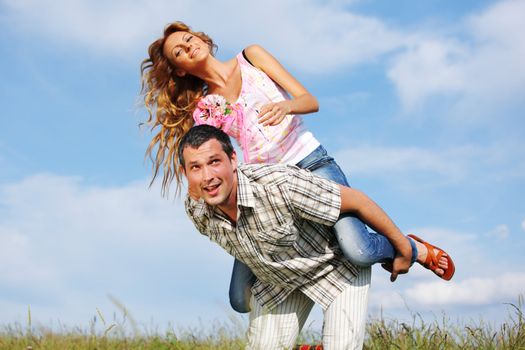 man and woman hug in the sky