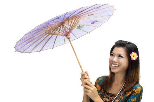 Portrait of a woman with kebaya with umbrella on white background